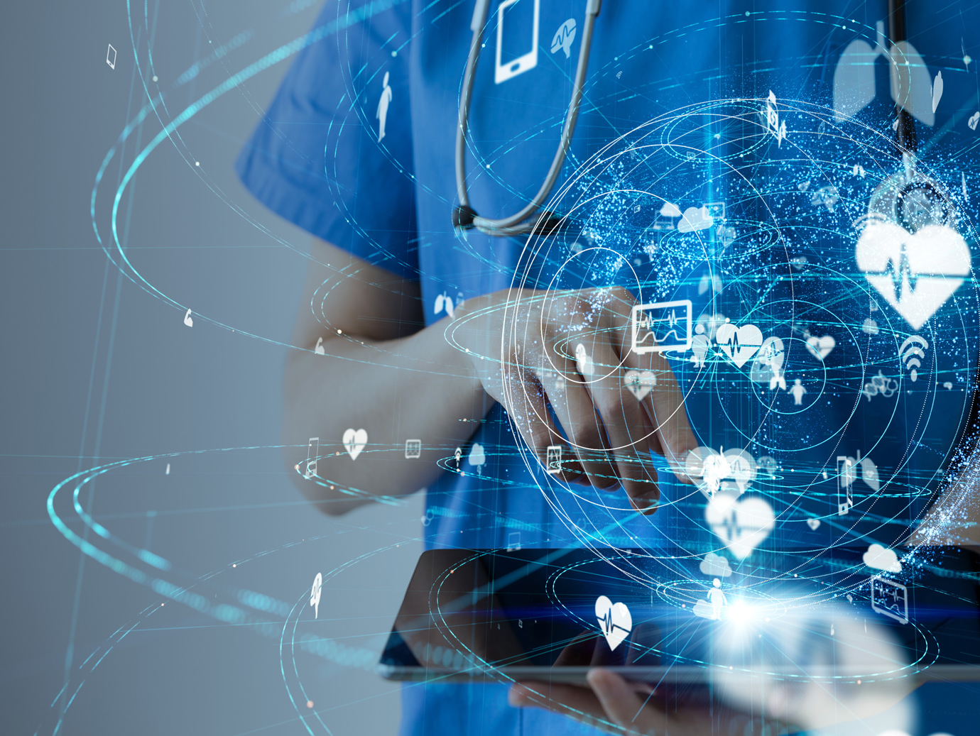 A healthcare worker pointing at a tab in the hand with concept healthcare icons covering the globe