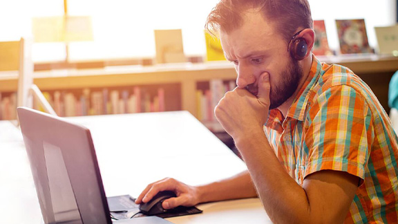 A person at work on his laptop