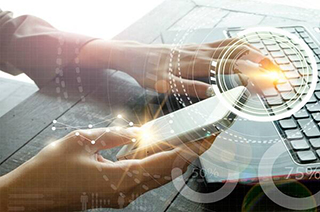 Close up of hands of a lady whose one hand is on keyboard and the other is holding the mobile overlaid with the newtork security icons