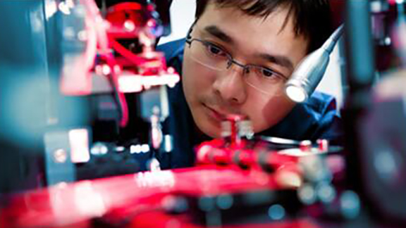 Close up of a scientist working on a electric circuit