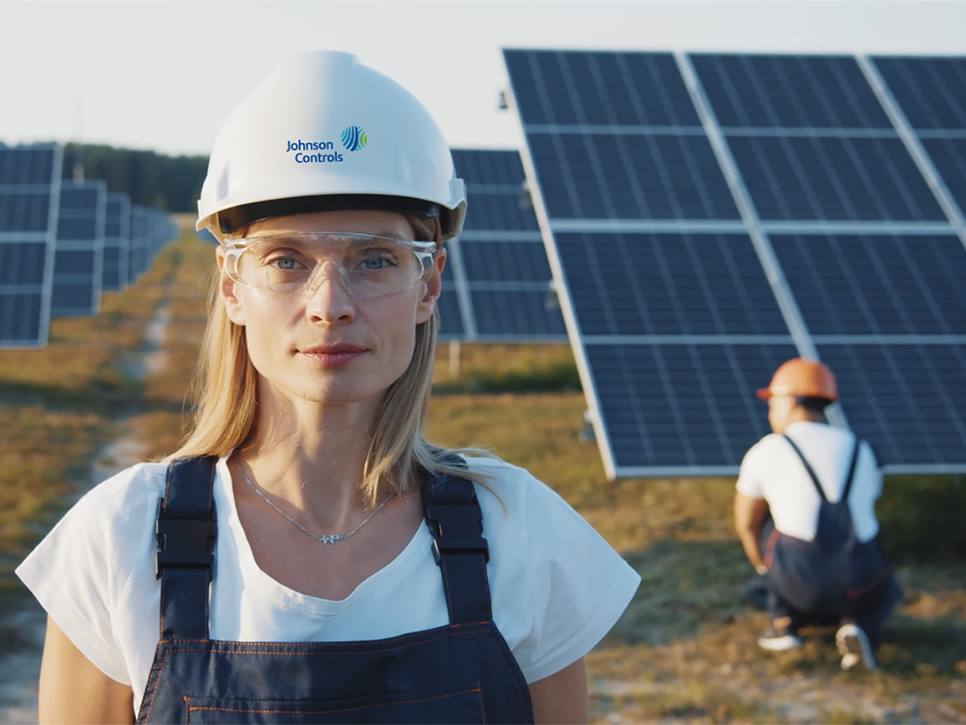 Close up of a female worker at the solar panel installation
